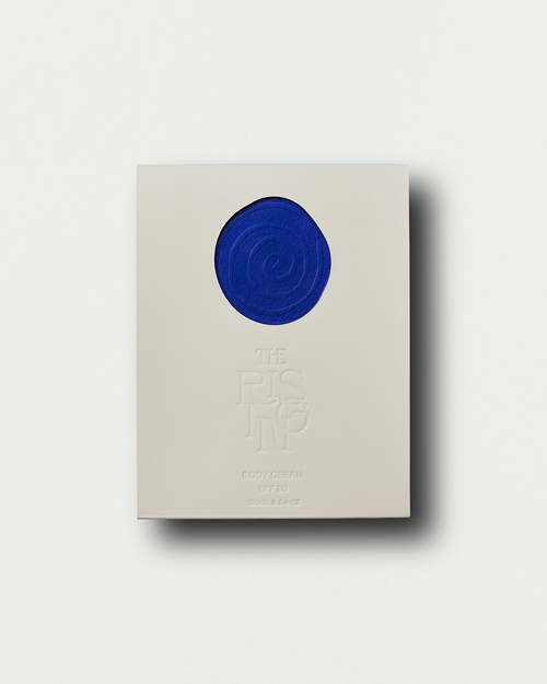 Beige box with a blue circular design on a white background