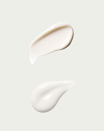 Two texture swatches of white cream on a light gray background