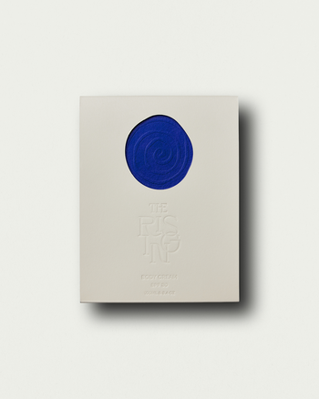 Beige box with a blue circular design on a white background